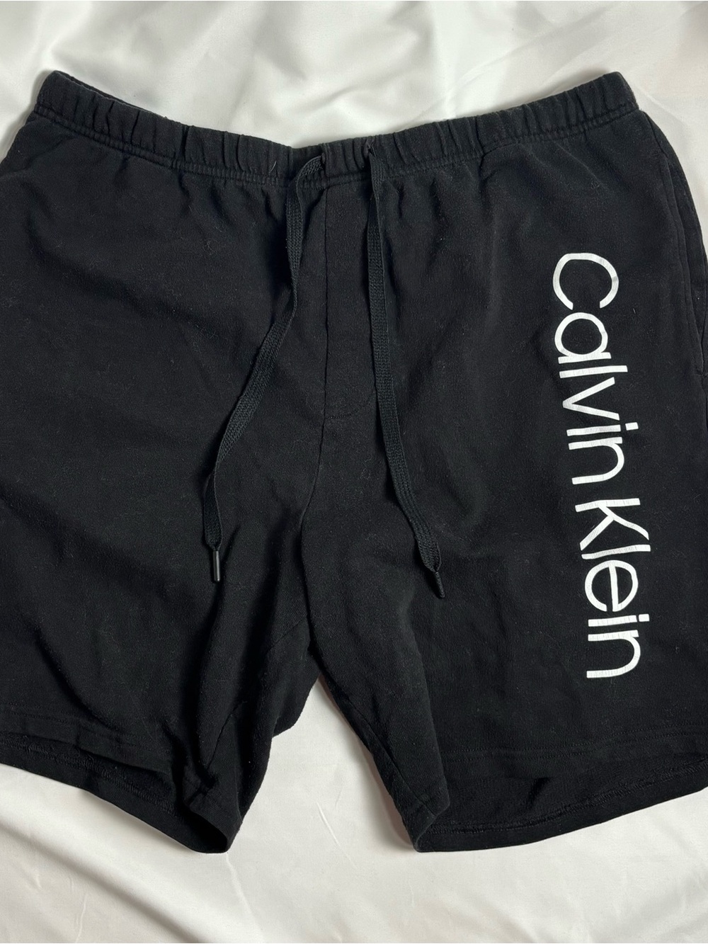 Calvin Klein Black Swim Trunks with White Vertical Logo